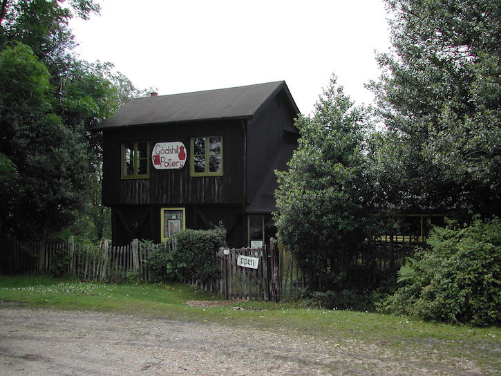 Modern photograph of Godshill pottery with 'open' sign