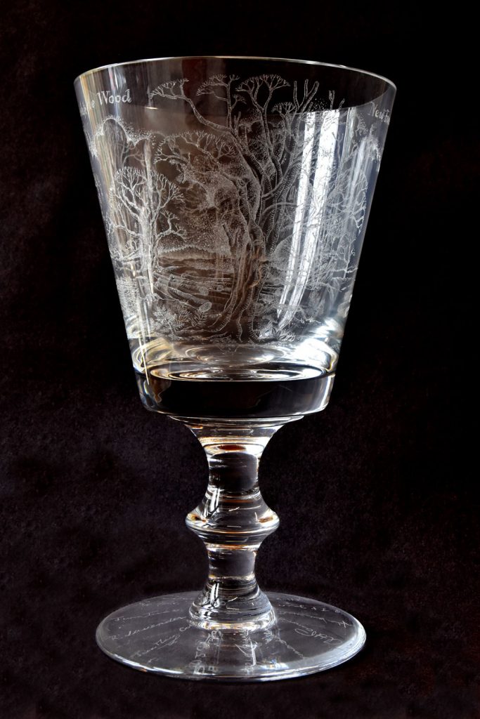 Glass goblet carved with images of Rushpole Wood